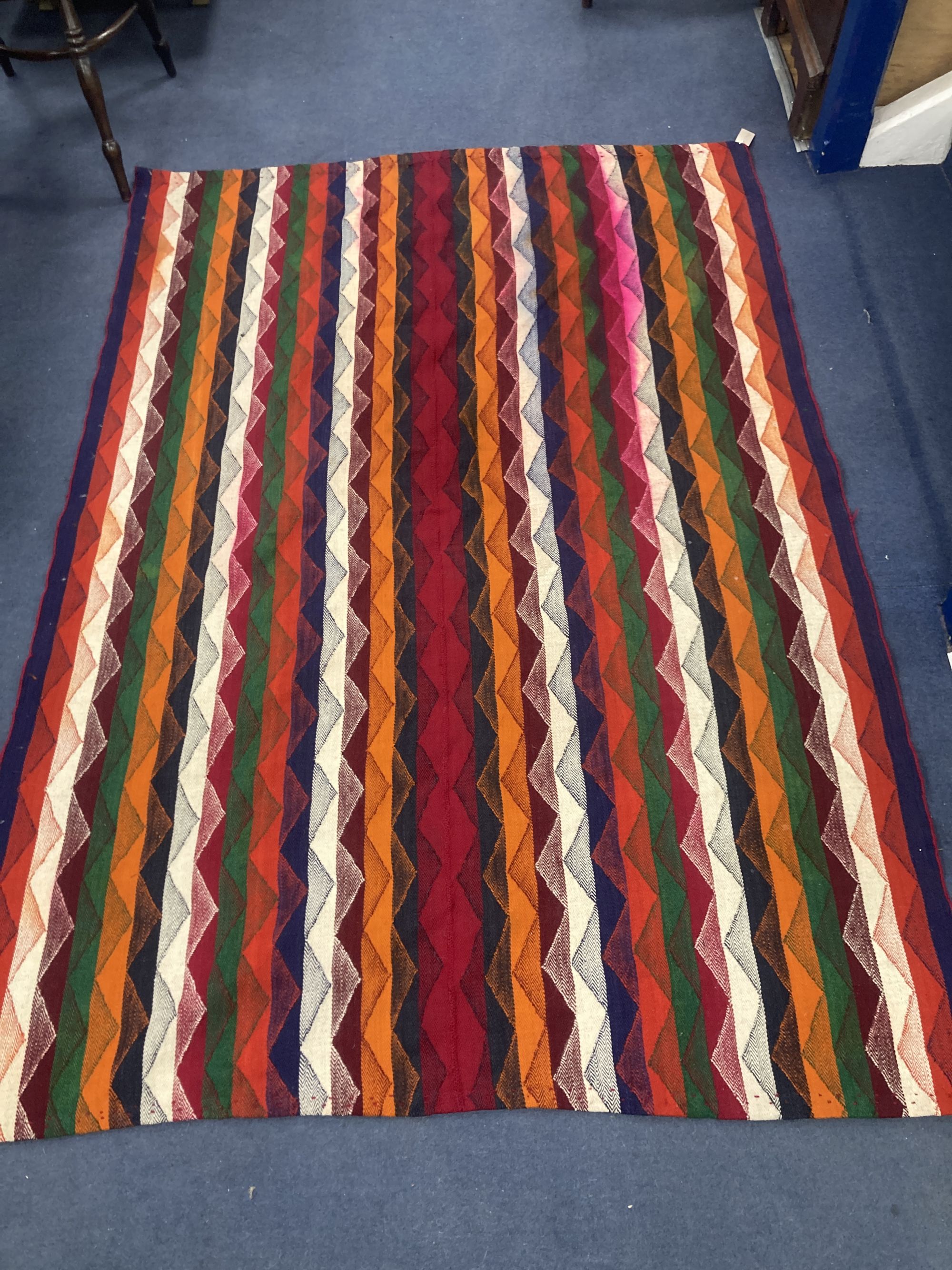 A Kelim polychrome flatweave rug, 210 x 150cm